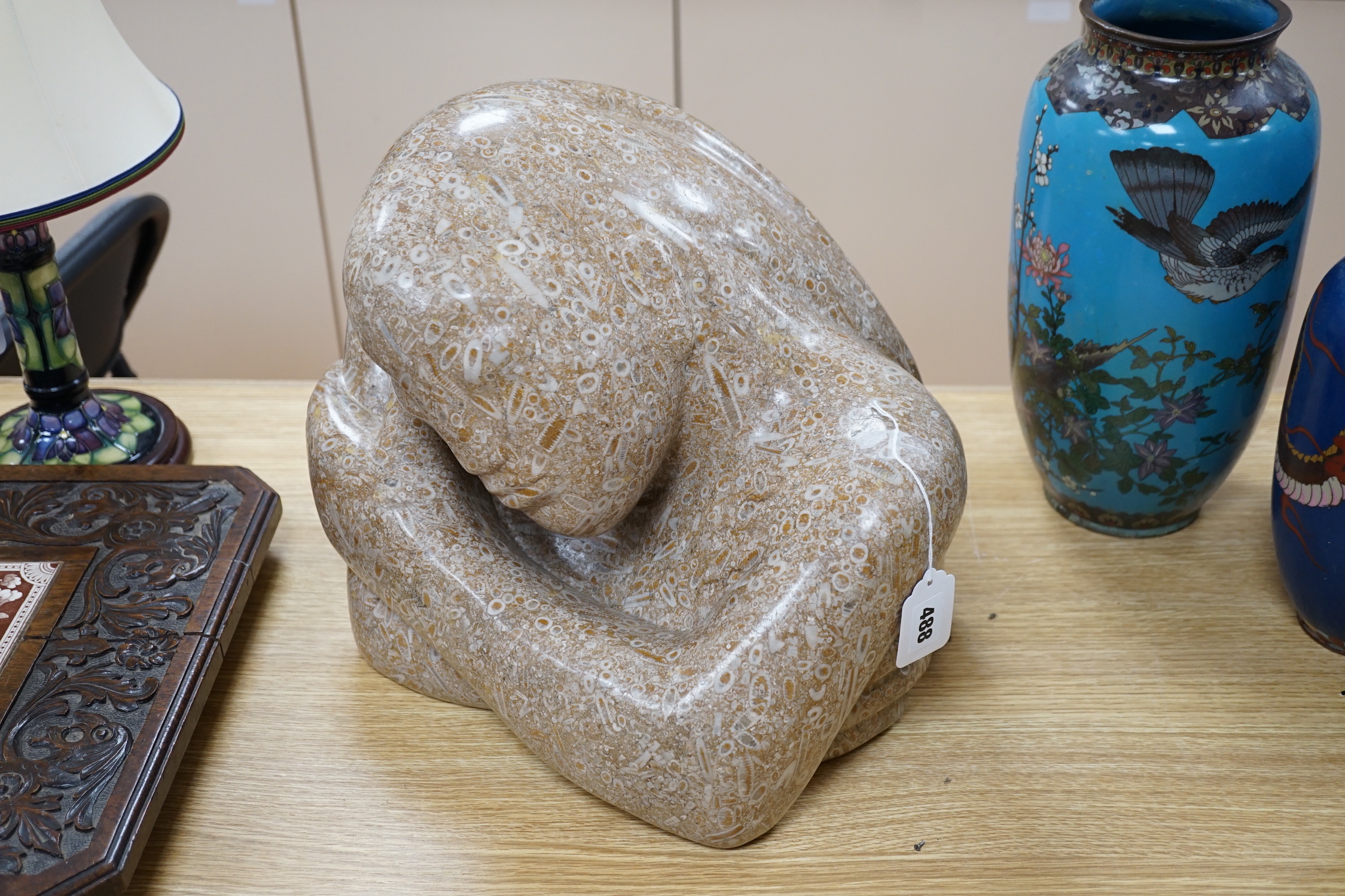 Polly Ionides (b. 1944), a Swaledale fossil stone bust of a lady, ‘Daydream’, 41cm wide